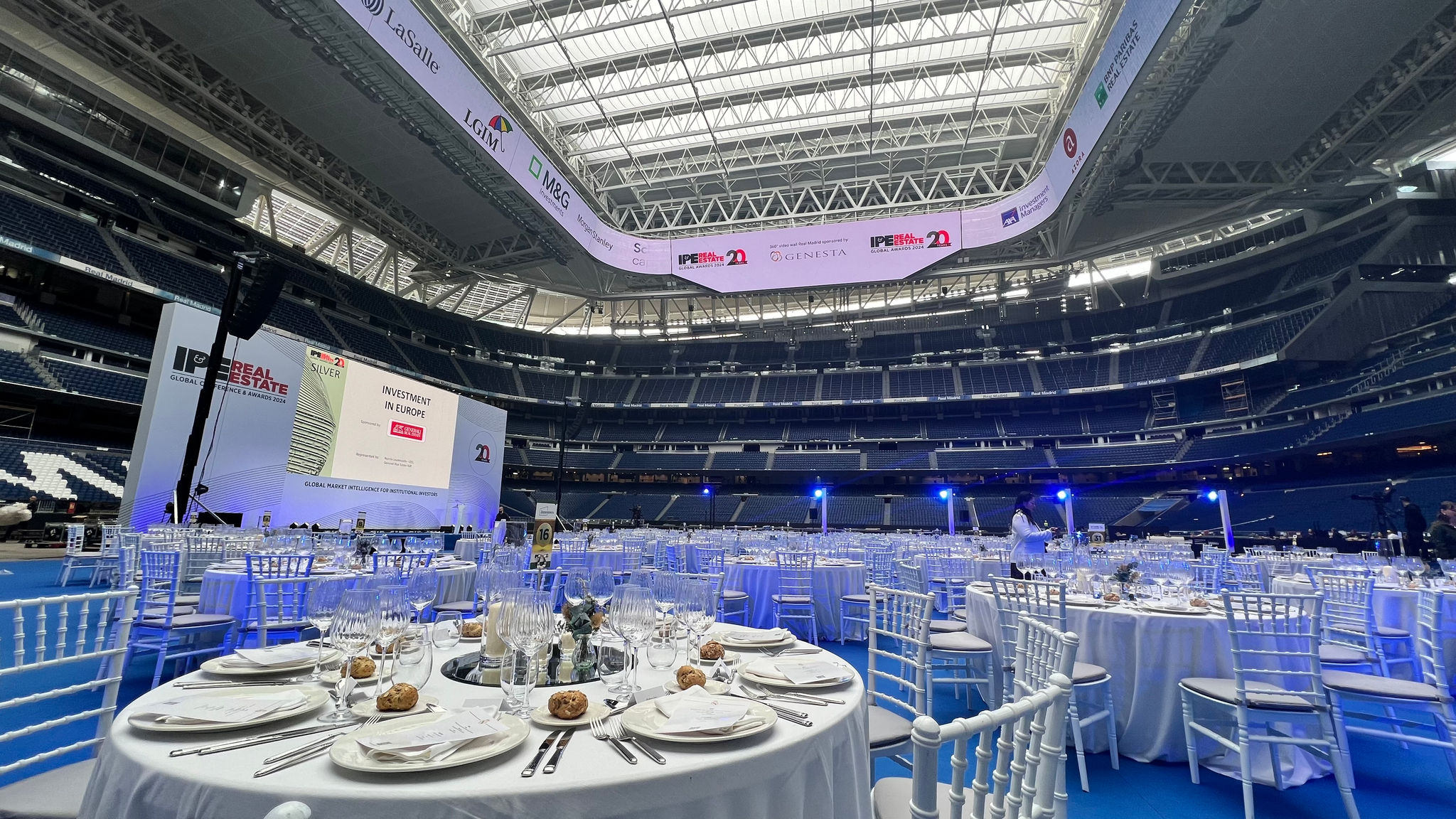 white dinner tables on the football pitch